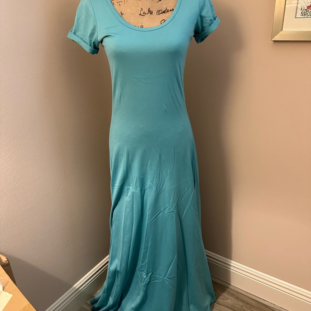 Jersey fabric maxi dress in turquoise blue. Never worn, new without tags